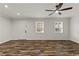 Bright living room featuring stylish flooring, modern ceiling fan, and neutral paint at 111 Northdale Pl, Lawrenceville, GA 30046