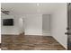 Bright living room featuring stylish flooring, modern ceiling fan, and neutral paint at 111 Northdale Pl, Lawrenceville, GA 30046