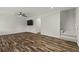 Bright living room featuring stylish flooring, modern ceiling fan, and neutral paint at 111 Northdale Pl, Lawrenceville, GA 30046
