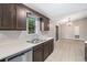 Spacious kitchen with stainless steel dishwasher and sink; lots of countertop space at 162 Riverchase Dr, Woodstock, GA 30188