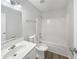 Bathroom with combined shower and tub, single sink vanity and vinyl flooring at 2628 Downingwood Ln, Grayson, GA 30017