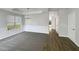 Bright dining area with modern chandelier, neutral paint, and ample natural light at 2628 Downingwood Ln, Grayson, GA 30017