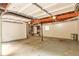Unfinished basement offers ample space with concrete floors, exposed ceiling, and potential for customization at 5911 Christopher Ln, Lithonia, GA 30058