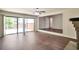 Bright living room featuring access to a deck through sliding glass doors and hardwood floors at 5911 Christopher Ln, Lithonia, GA 30058