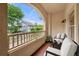 Outdoor view from a balcony with outdoor chairs, table and greenery at 960 Taft Ne Ave # 9, Atlanta, GA 30309