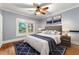Well-lit bedroom showcasing hardwood floors, ceiling fan, and neutral tones at 960 Taft Ne Ave # 9, Atlanta, GA 30309