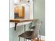 Eat-in dining area featuring breakfast bar and seating, with view into the kitchen at 960 Taft Ne Ave # 9, Atlanta, GA 30309