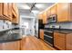 Functional kitchen with stainless steel appliances and wooden cabinetry at 960 Taft Ne Ave # 9, Atlanta, GA 30309