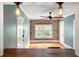Bright living room featuring exposed brick wall and two entry ways at 960 Taft Ne Ave # 9, Atlanta, GA 30309