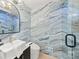 Modern bathroom with marble tile and sleek fixtures at 1583 Nantahalla Ne Ct, Atlanta, GA 30329