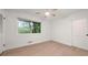Bright bedroom with hardwood floors and a ceiling fan at 1583 Nantahalla Ne Ct, Atlanta, GA 30329