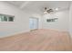 This bedroom boasts natural light, hardwood floors, and all-white walls at 1583 Nantahalla Ne Ct, Atlanta, GA 30329