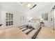 Well-lit bedroom boasts skylights, stylish decor, and gleaming hardwood flooring at 1583 Nantahalla Ne Ct, Atlanta, GA 30329