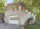 Exterior of a two-story brick home with a two-car garage and landscaping at 1583 Nantahalla Ne Ct, Atlanta, GA 30329
