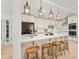 Modern kitchen with a large island, double ovens, and pendant lighting at 1583 Nantahalla Ne Ct, Atlanta, GA 30329