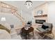 Cozy living room with fireplace, modern decor, and stairway at 1583 Nantahalla Ne Ct, Atlanta, GA 30329