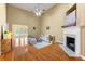 Bright living room boasts hardwood floors, fireplace, high ceilings and abundant natural light at 3219 Abbott Dr # 5, Powder Springs, GA 30127