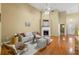 Bright living room boasts hardwood floors, fireplace, high ceilings and abundant natural light at 3219 Abbott Dr # 5, Powder Springs, GA 30127