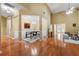 Elegant living room boasts tall ceilings, hardwood floors, natural light, and views into the kitchen at 3219 Abbott Dr # 5, Powder Springs, GA 30127