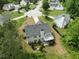Aerial view of home showcasing landscaped yard, deck and mature trees at 4219 David Austin Ct, Snellville, GA 30039