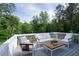 Outdoor deck with cushioned seating arrangement, perfect for entertaining guests and relaxation at 4219 David Austin Ct, Snellville, GA 30039