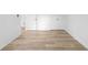 Finished basement area featuring white trim, neutral walls, and light colored flooring at 4219 David Austin Ct, Snellville, GA 30039