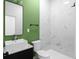 Modern bathroom featuring white marble shower, contemporary fixtures, and square sink at 4219 David Austin Ct, Snellville, GA 30039