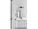 Elegant bathroom with modern vanity, framed mirror, and updated fixtures at 4219 David Austin Ct, Snellville, GA 30039