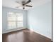 Bedroom with ceiling fan and ample natural light at 4219 David Austin Ct, Snellville, GA 30039