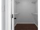 This walk-in closet features hardwood floors and wire rack shelving at 4219 David Austin Ct, Snellville, GA 30039