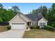 Charming single-Gathering home featuring a two-car garage and well-maintained landscaping at 4219 David Austin Ct, Snellville, GA 30039
