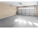 Spacious two-car garage with an automatic door and concrete flooring at 4219 David Austin Ct, Snellville, GA 30039