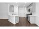 Modern kitchen featuring gray cabinets, stainless steel appliances, and a convenient island counter at 4219 David Austin Ct, Snellville, GA 30039