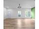Bright living room with ample natural light and stylish chandelier at 4219 David Austin Ct, Snellville, GA 30039