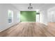 Bright living room with accent wall and large windows at 4219 David Austin Ct, Snellville, GA 30039