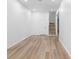 Spacious living room with wood floors, recessed lighting, and stairs at 4219 David Austin Ct, Snellville, GA 30039