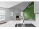 Living room showcases a cozy fireplace and views to a private outdoor space at 4219 David Austin Ct, Snellville, GA 30039