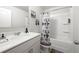 Clean bathroom featuring a vanity and a tub with a shower at , Atlanta, GA 30349