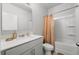 Clean bathroom featuring a shower and tub combination with vanity and sink at , Atlanta, GA 30349