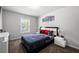 Stylish bedroom with comfortable queen size bed and chic contemporary decor at , Atlanta, GA 30349