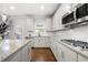 Modern kitchen featuring stainless steel appliances, granite countertops, and tile backsplash at , Atlanta, GA 30349