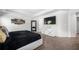 Spacious main bedroom suite with a large TV and elegant décor at , Atlanta, GA 30349
