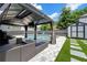 Outdoor living area with a metal gazebo, comfortable seating, and a view of the pool at , Atlanta, GA 30349