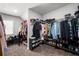 Spacious walk-in closet with custom shelving for clothes and shoes at , Atlanta, GA 30349