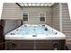 Close-up view of a modern hot tub with wooden paneling, promising relaxation and hydrotherapy at 225 Ruby Forest Pkwy, Suwanee, GA 30024