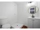 Modern bathroom with white vanity, sleek fixtures, and step-in shower at 2541 Peyton Woods Sw Trl, Atlanta, GA 30311