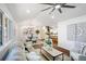 Living room features hardwood floors, natural light, modern decor with an open view into the kitchen at 2541 Peyton Woods Sw Trl, Atlanta, GA 30311