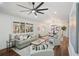 Bright living room featuring hardwood floors, natural light, and modern decor with natural views at 2541 Peyton Woods Sw Trl, Atlanta, GA 30311