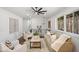 Cozy living room featuring hardwood floors, natural light, modern decor with natural views at 2541 Peyton Woods Sw Trl, Atlanta, GA 30311