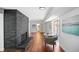 Spacious living room features wood floors, brick fireplace, and natural light at 2541 Peyton Woods Sw Trl, Atlanta, GA 30311
